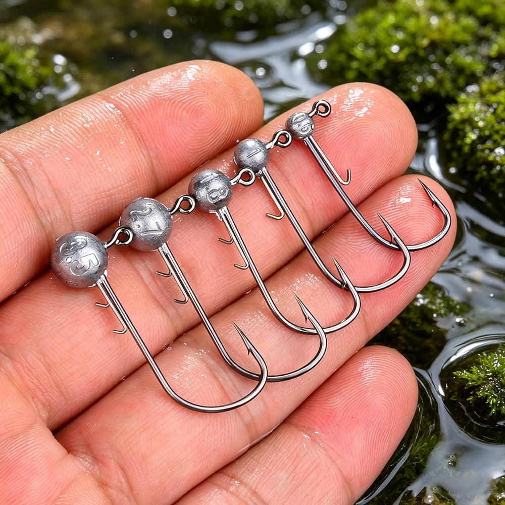 Hand holding PROBEROS JIG050 mini ultra-light weight lead ball jig head hooks
