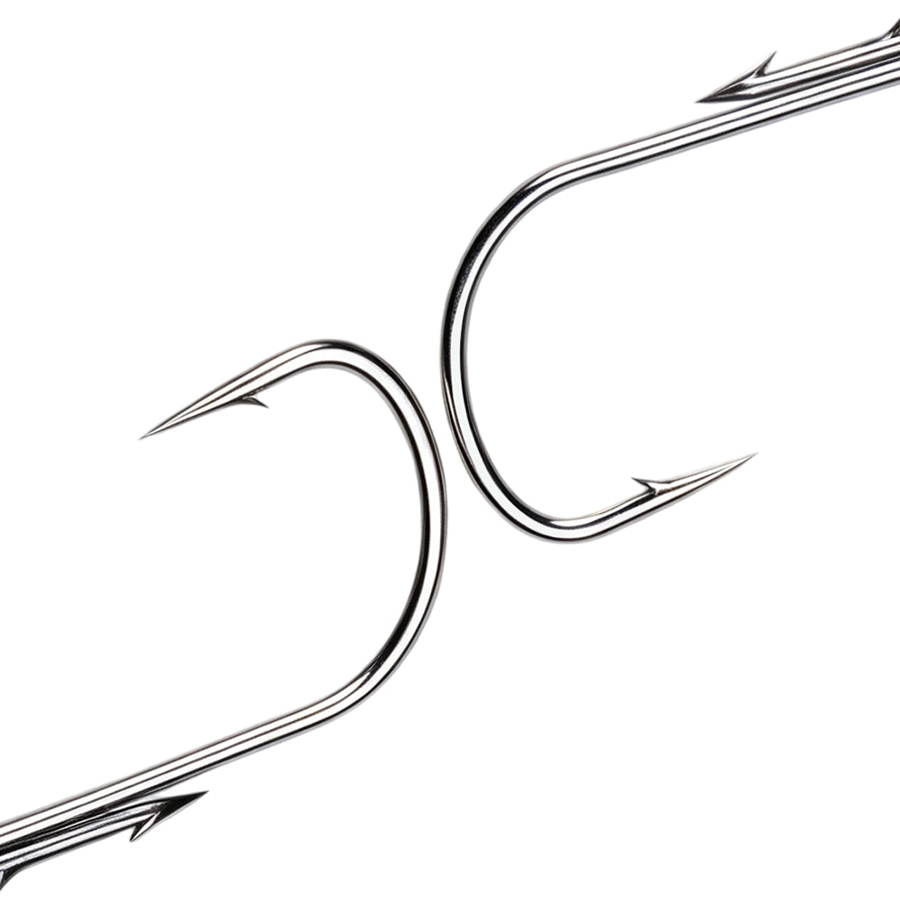 Raw lead ball jig head with integrated dual bait keepers for holding soft plastic swimbaits