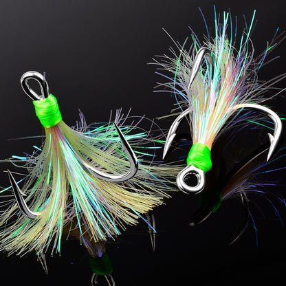 Close-up of PROBEROS SZ126 silver treble hook with white flash feather tail and barbed point