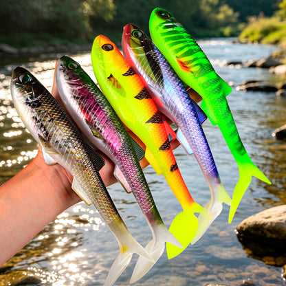 Multi‑color SUNLURE RL5600 paddle tail swimbait placed on river shore wild fishing scene